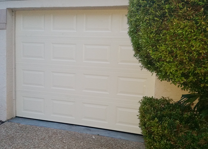 New raised-panel garage door after replacement by Atlantic Ocean Garage Doors